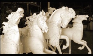 Carousel horses in white primer paint only