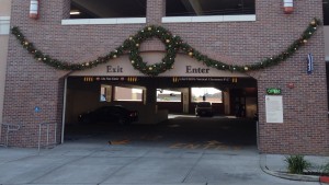 Garland and wreath hang over entrance