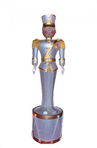 small toy soldier on drum base