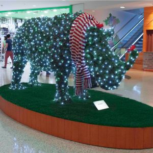 Rhinocerus topiary animal on platform in shopping mall