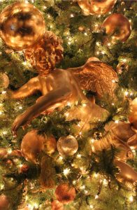 Cherub angel ornament on Christmas tree