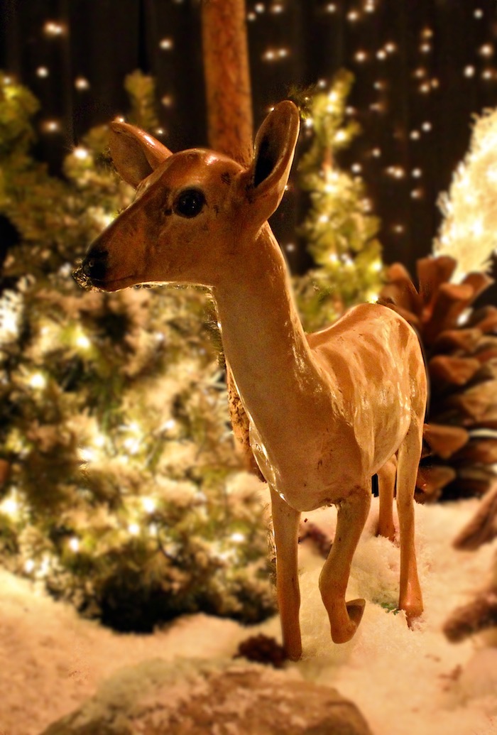 small standing fiberglass sculpted deer
