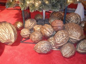 Giant Walnuts displayed under Christmas Tree